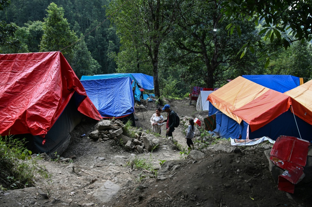 Some people in Nepal are concerned about living in the temporary shelters as winter approaches — Prakash MATHEMA / AFP