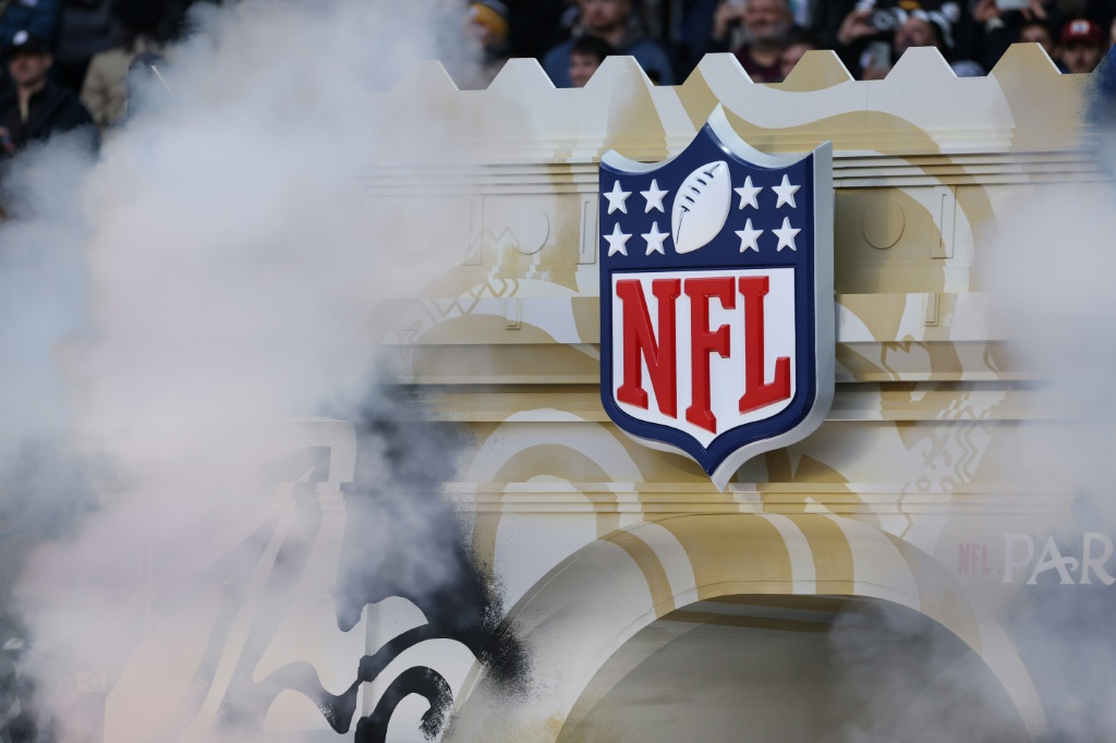 A scaled-down Arc de Triomphe serves as the entrance portal for players prior to the NFL Paris Game — FRANCK FIFE / AFP