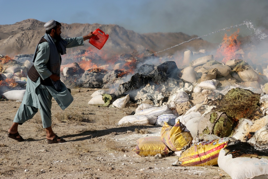 The Taliban burns seized drugs on the outskirts of Herat — Mohsen KARIMI / AFP