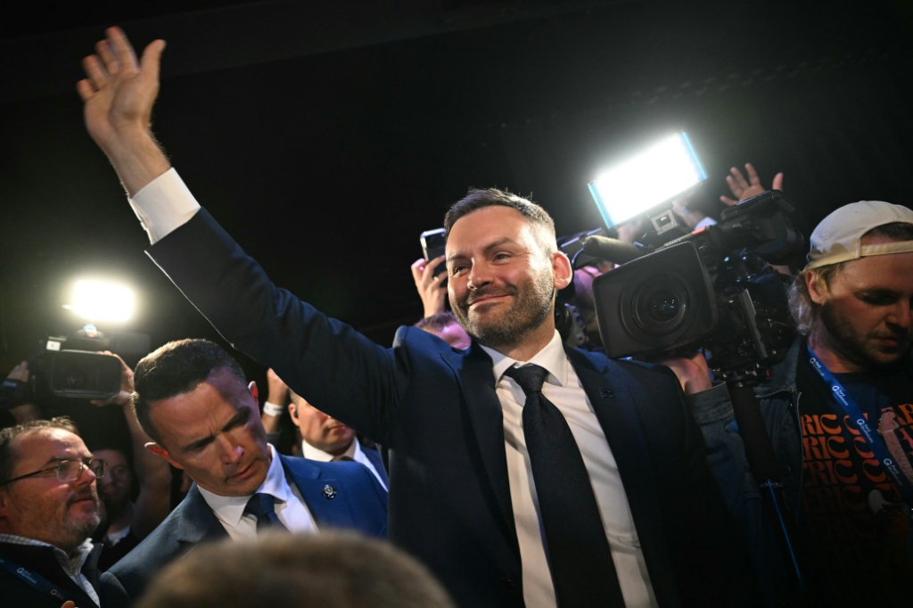 Leader of the Parti Quebecois, Paul St-Pierre Plamondon, celebrates his victory to become the next premier of Quebec, a Canadian province with a simmering separatist movement — Andrej Ivanov / AFP