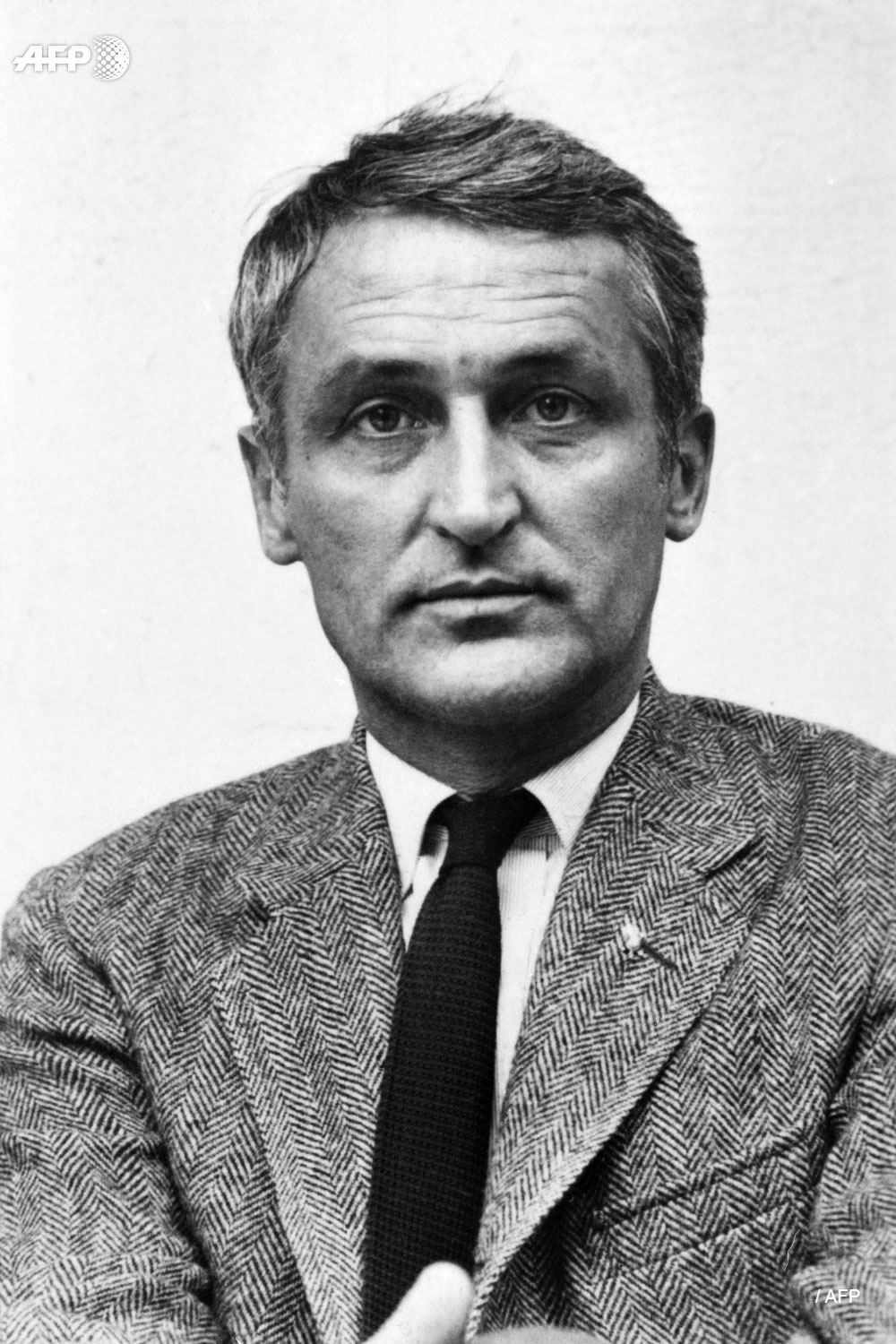 Photographie (lieu et date inconnus) de François Pelou, grand reporter de guerre de l'AFP, décédé le 4 mai 2019 à l'âge de 94 ans. © AFP