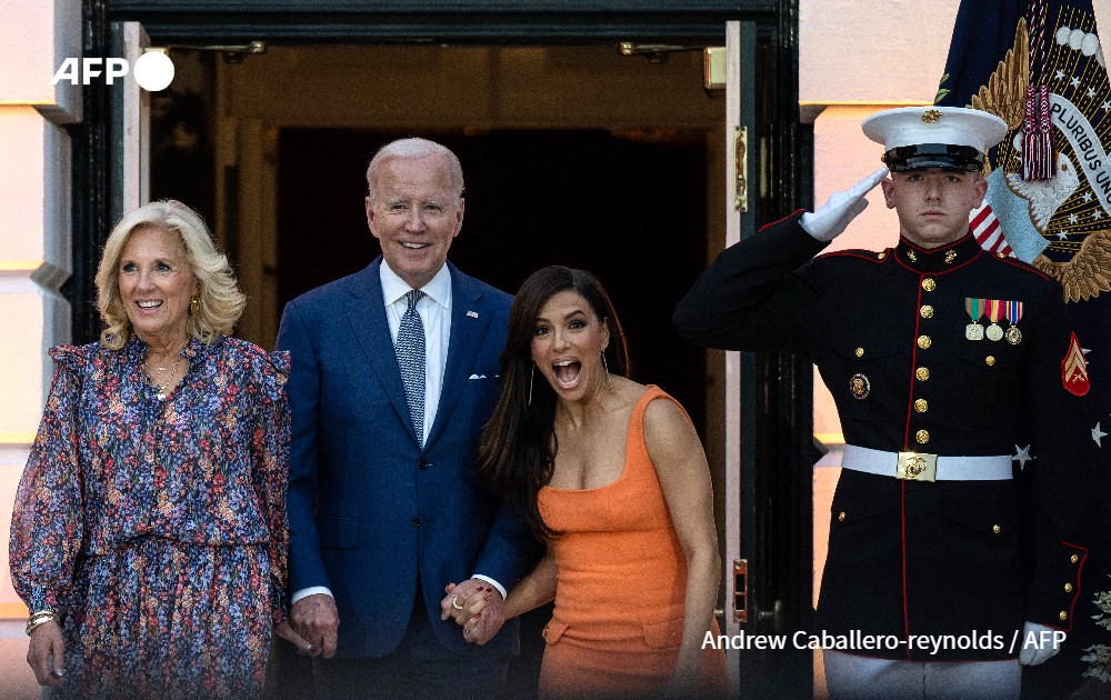 US First Lady Jill Biden, US President Joe Biden and US actress and director Eva Longoria arrive for a screening of a film