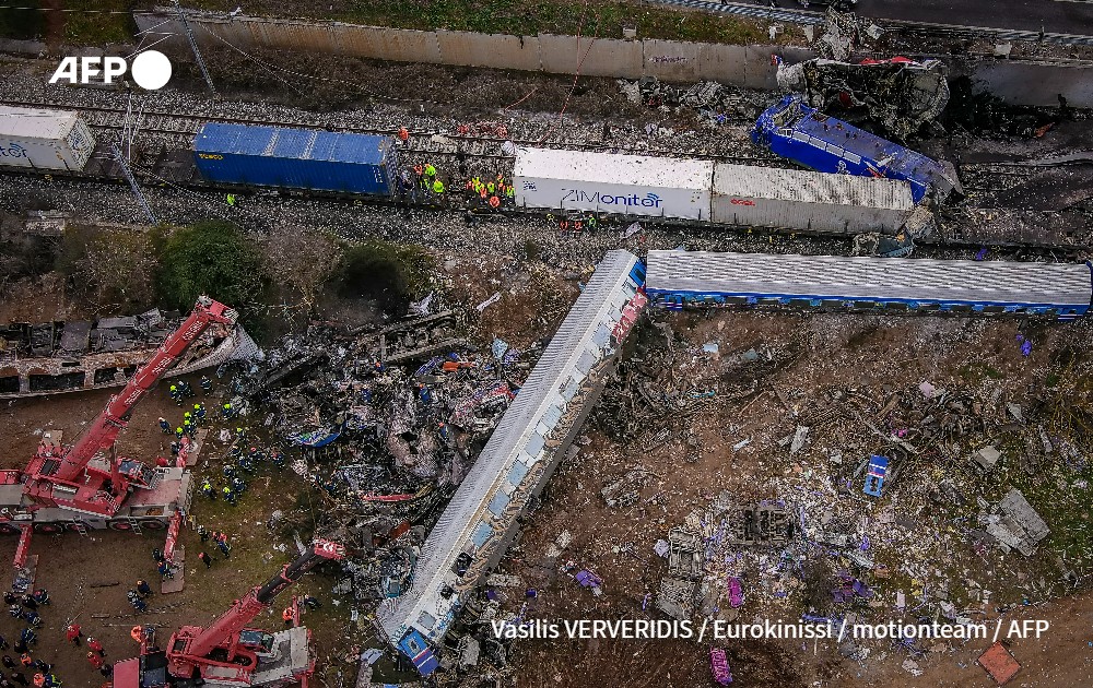 Emergency crews searching wreckage after a train accident in Greece
