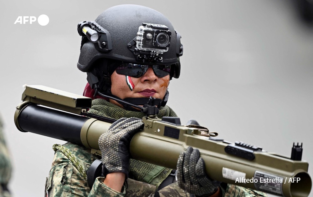 A woman soldier takes part in the military parade