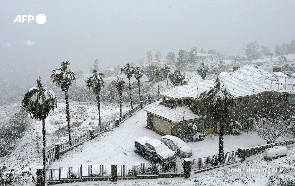 Snow blankets a home in Caliornia