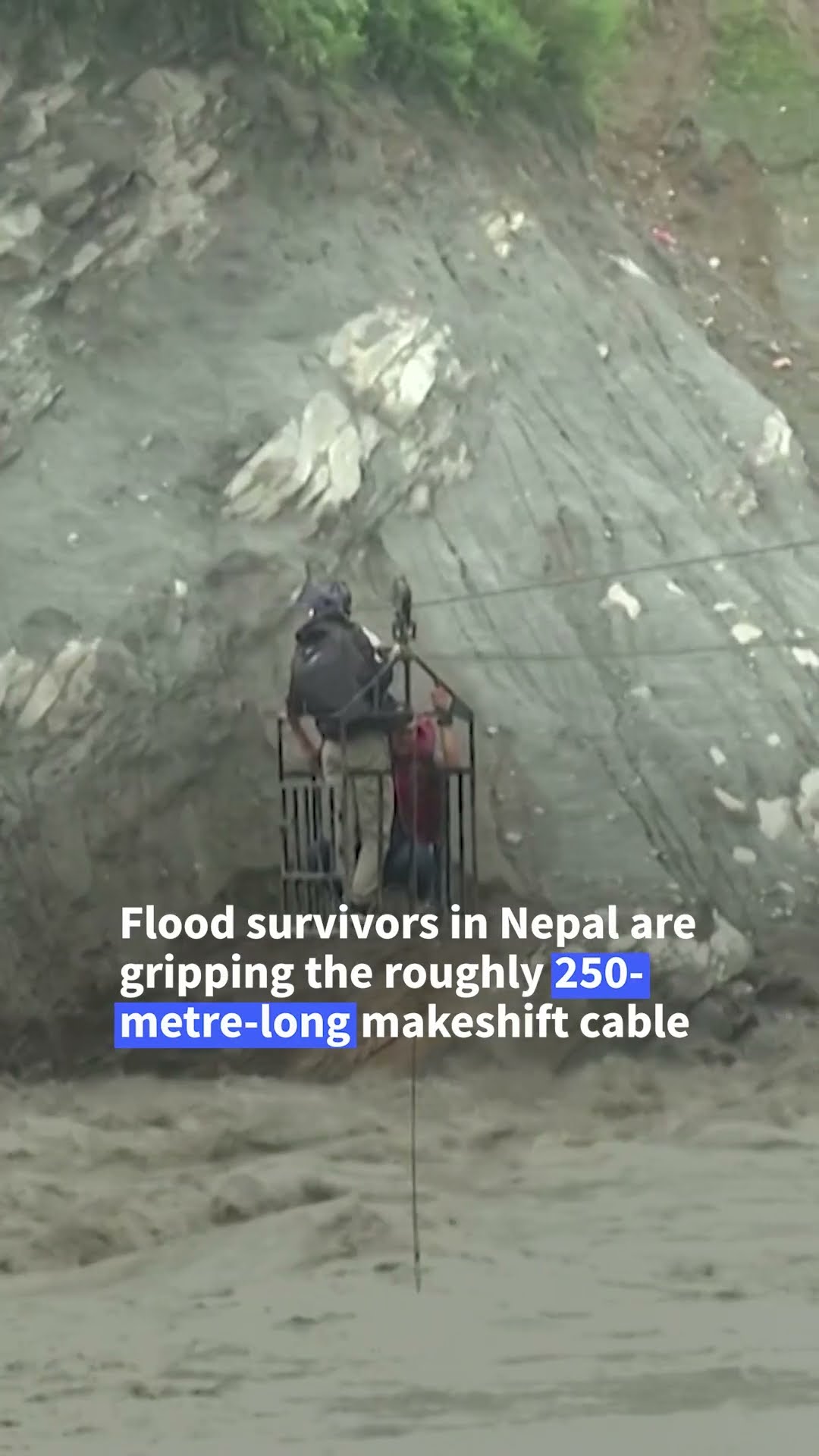 Survivors cling to zipline after Nepal floods destroy bridges | AFP