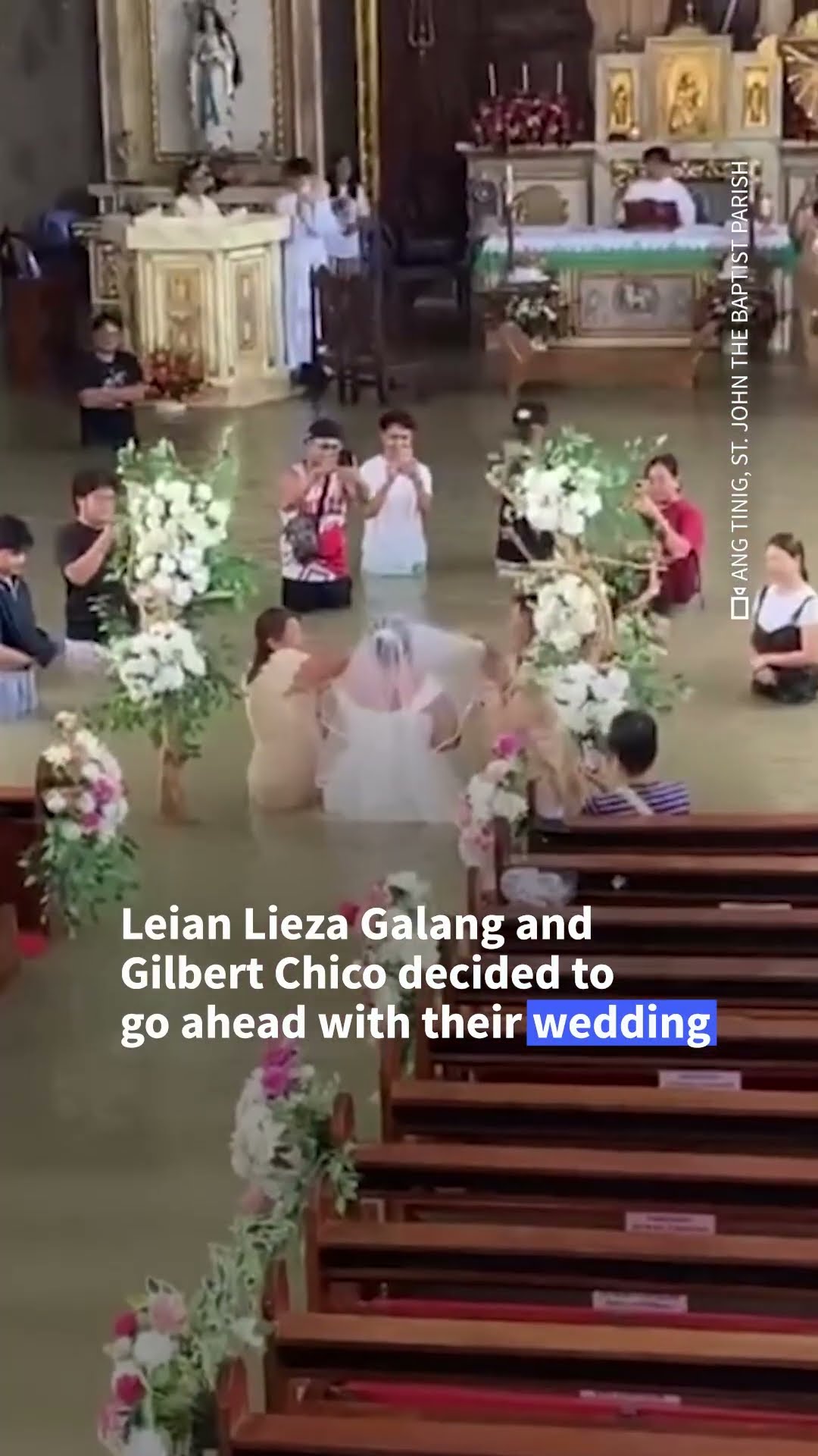 Philippine couple gets married in flooded church | AFP