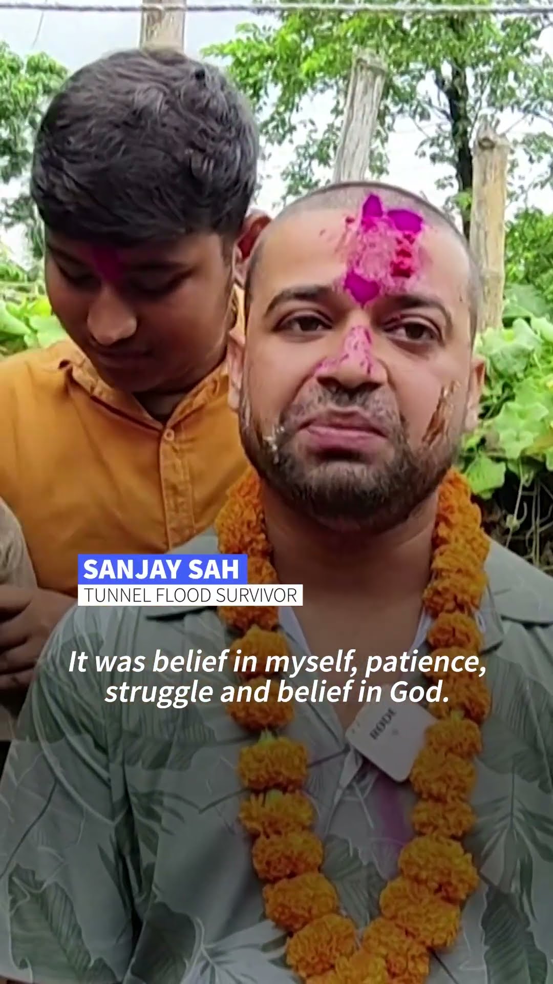Nepali tunnel flood survivor welcomed home after 10-day ordeal | AFP