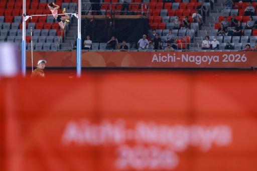 Japan's Misaki Morota on her way to women's pole vault gold on Friday, watched by a sparse crowd at the Mizuho Park Athletics Stadium in Nagoya — DAVID GRAY / AFP