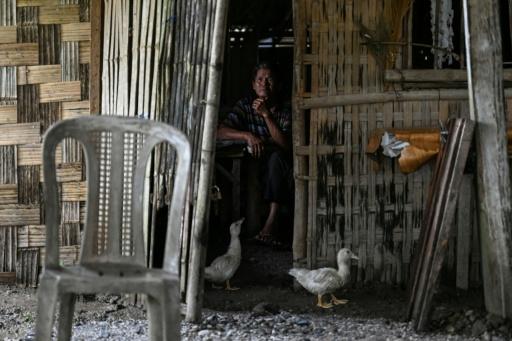 A resident in Capas, Tarlac province — Jam STA ROSA / AFP
