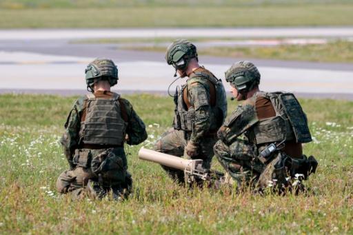 German soldiers with drone jamming equipment. Drones have become a central part of the landscape of modern warfare — FOCKE STRANGMANN / AFP