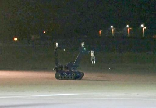 A bomb disposal robot deployed by Germn police at Leipzig airport after the discovery an explosive-laden drone — - / AFP