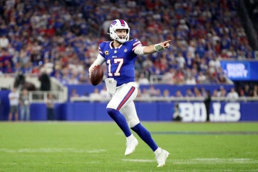 Allen lights up Bills' new stadium with 41-31 win over Lions