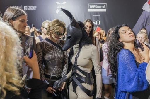 Arina based her designs on creatures her father had imagined — Roman PILIPEY / AFP