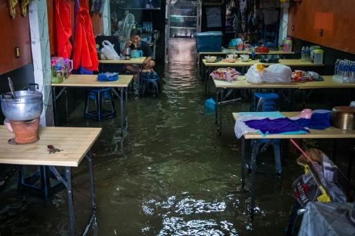 More rain is forecast for Bangkok and surrounding areas after authorities declared a flood disaster across the Thai capital — Arnun Chonmahatrakool / AFP