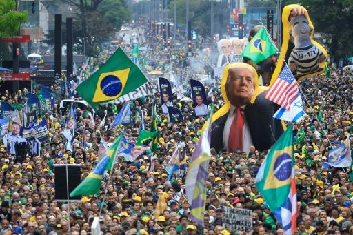 Scandal-weary Brazilians to vote as Lula faces Bolsonaro son