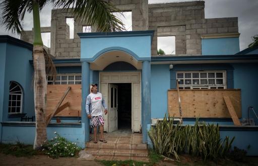 Juan Manuel Sarabia boarded up his house in Puerto San Carlos on Mexico's Baja California peninsula ahead of the arrival of Hurricane Polo — Carl de Souza / AFP