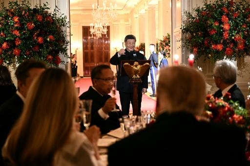 China's President Xi Jinping proposes a toast during a State Dinner hosted by US President Donald Trump in the East Room of the White House — Brendan SMIALOWSKI / AFP