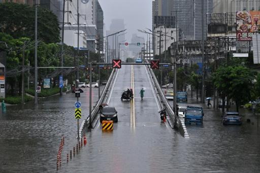 Canals full, roads submerged as Bangkok declares flood disaster