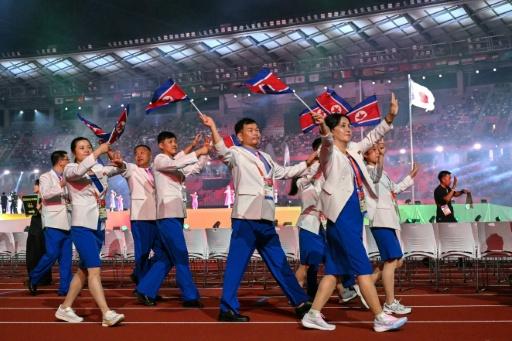 Members of North Korea's delegation — MOHD RASFAN / AFP