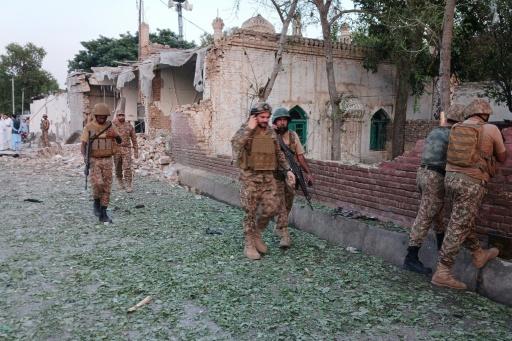Death toll from attack at police HQ in Pakistan rises to 31