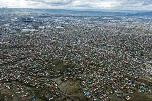 Mongolia's capital Ulaanbaatar has long been plagued by notorious traffic jams and suffocating winter smog -- the result of breakneck urban growth and infrastructure that has struggled to keep up — Hector RETAMAL / AFP