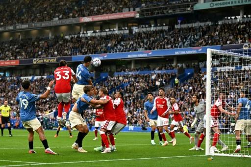 Chema Andrés inscrit le 3e but de Brighton lors de sa victoire à domicile contre Arsenal, le 19 septembre 2026 — Glyn KIRK / AFP