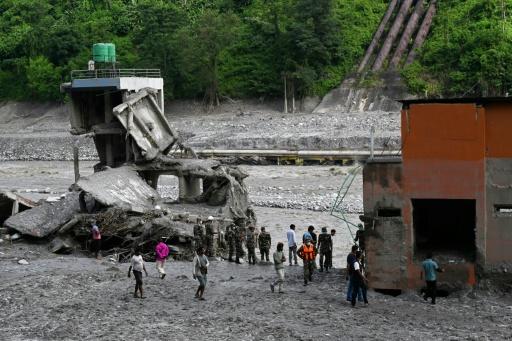 Experts from India, China, Australia and South Korea have been aiding Nepali rescuers in their search of survivors — Prakash MATHEMA / AFP
