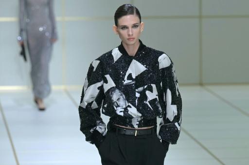 Armani sprinkles glitter on discreet elegance at Milan show
