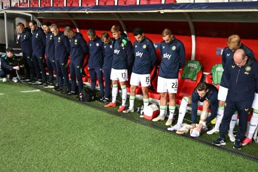 Ireland's players came out for the match in Hungary wearing black armbands and bowed their heads as the Israeli national anthem was played — Attila KISBENEDEK / AFP