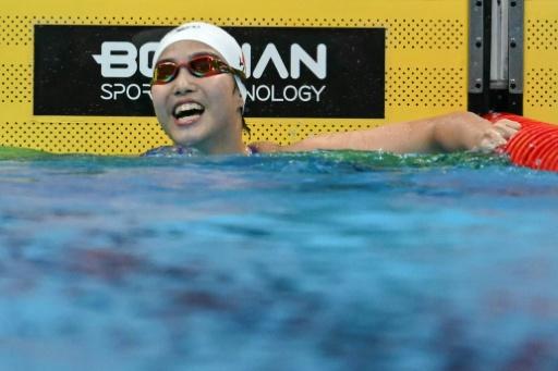 Swimming prodigy Yu, 13, says 'interviews way harder than racing'