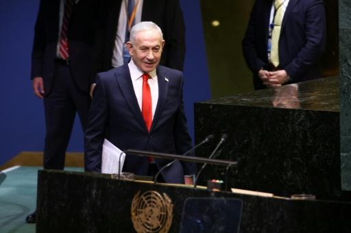 Delegates jeered and booed, while Netanyahu's own team stood and applauded — Leonardo MUNOZ / AFP