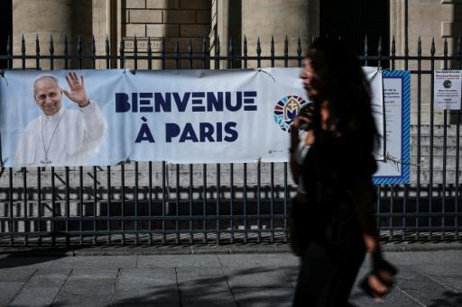 Banners welcoming Leo are unfurling across the French capital — SIMON WOHLFAHRT / AFP