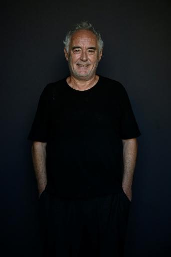 El cocinero Ferran Adrià sonríe ante la cámara durante una entrevista sobre la serie 'Génesis', el 21 de septiembre de 2026 en el Festival de Cine de San Sebastián, al norte de España — Ander Gillenea / AFP