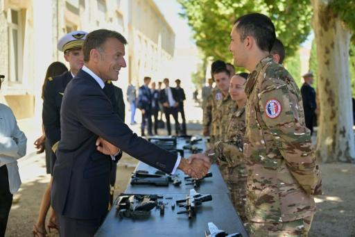 Macron hails 'collective endeavour' at meeting with military volunteers