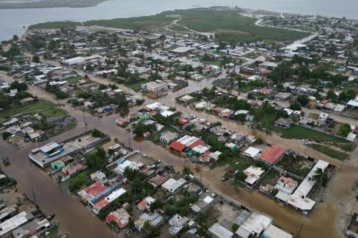 Floodwaters inundated Puerto San Carlos and other towns along Mexico's Pacific coast on Baja California peninsula with the arrival of Hurricane Polo — Carl de Souza / AFP