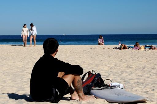 Australia used to be generous with allowing young visitors to spend a couple of years travelling and working in the country, but that is changing — Xiaoyu Yin / AFP