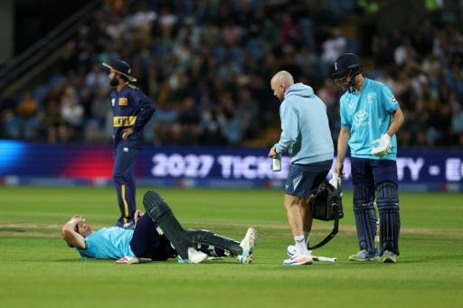 England's Jos Buttler goes down injured during the 2nd ODI against Sri Lanka at Headingley — Darren Staples / AFP