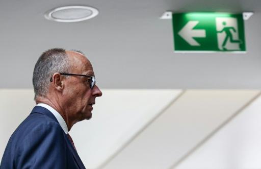 Germany's Chancellor Friedrich Merz is fighting to stave off speculation about his exit from the top job — Jens SCHLUETER / AFP