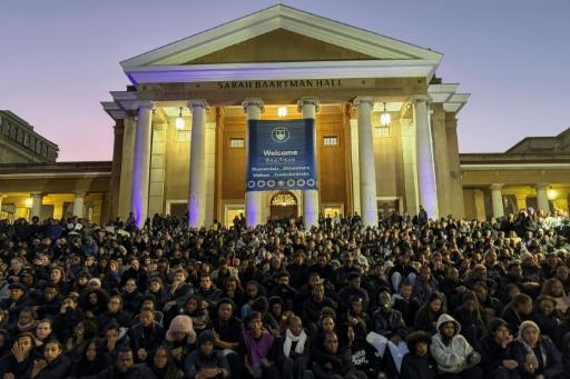 University students in Cape Town held a vigil to protest the recent killings — Saawmiet MOOS / AFP