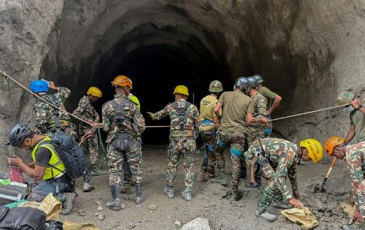 The search continues for a hundred hydropower workers missing since a wall of mud and debris swept through the region on August 26 after a vast glacial and rock collapse on a mountain on the China-Nepal border — Handout / AFP