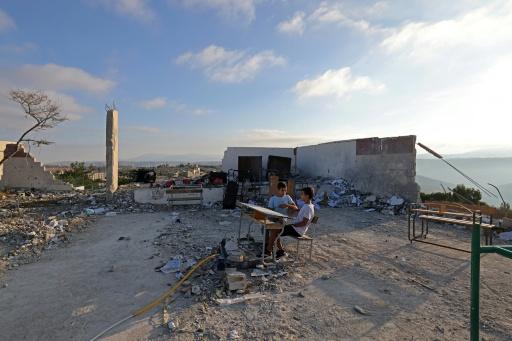 The students come from areas heavily hit by Israeli attacks and most were displaced during the war, with some returning to find their homes damaged or destroyed — Anwar AMRO / AFP