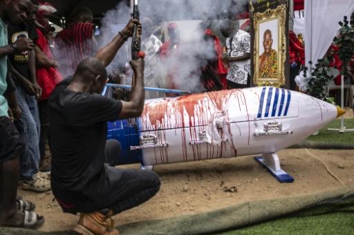 'Figurative' or 'fantasty' coffins are just one part of some Ghanaian funeral rites, which also include the firing of traditional firearms — OLYMPIA DE MAISMONT / AFP