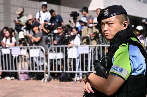 En agosto, un tribunal dictaminó que los activistas habían violado la Constitución china al exigir el "fin de la dictadura de partido único" — Peter PARKS / AFP
