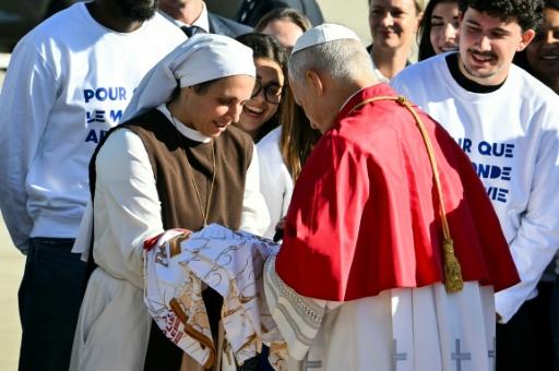 A million people are expected at events across Paris during the first two days of Pope Leo's trip — Alberto PIZZOLI / AFP