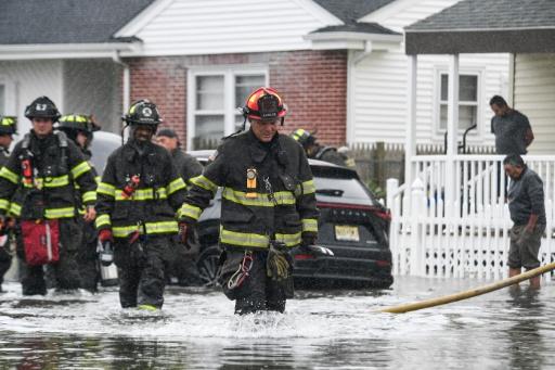 Rescue crews were out in full force as the storm wreaked havoc up and down the coast — Matthew HATCHER / AFP