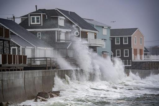 Waves pounded coastal homes — Joseph Prezioso / AFP