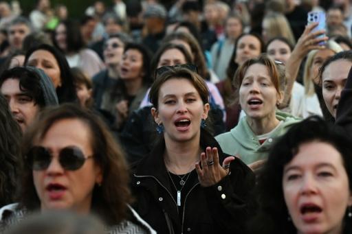 There is no formal ban on the choirs that have sprung up across the country — Igor IVANKO / AFP