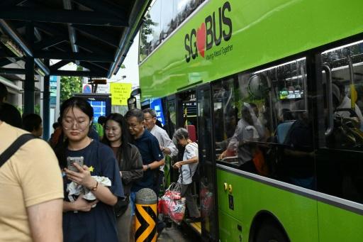 Propping feet on bus seats carries $400 penalty in 'Fine City' Singapore
