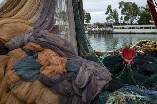 Mehmet Ozlu, 53,  was badly hurt when a drone attacked the fishing boat he was on in July, killing the captain, his childhood friend — Yasin AKGUL / AFP